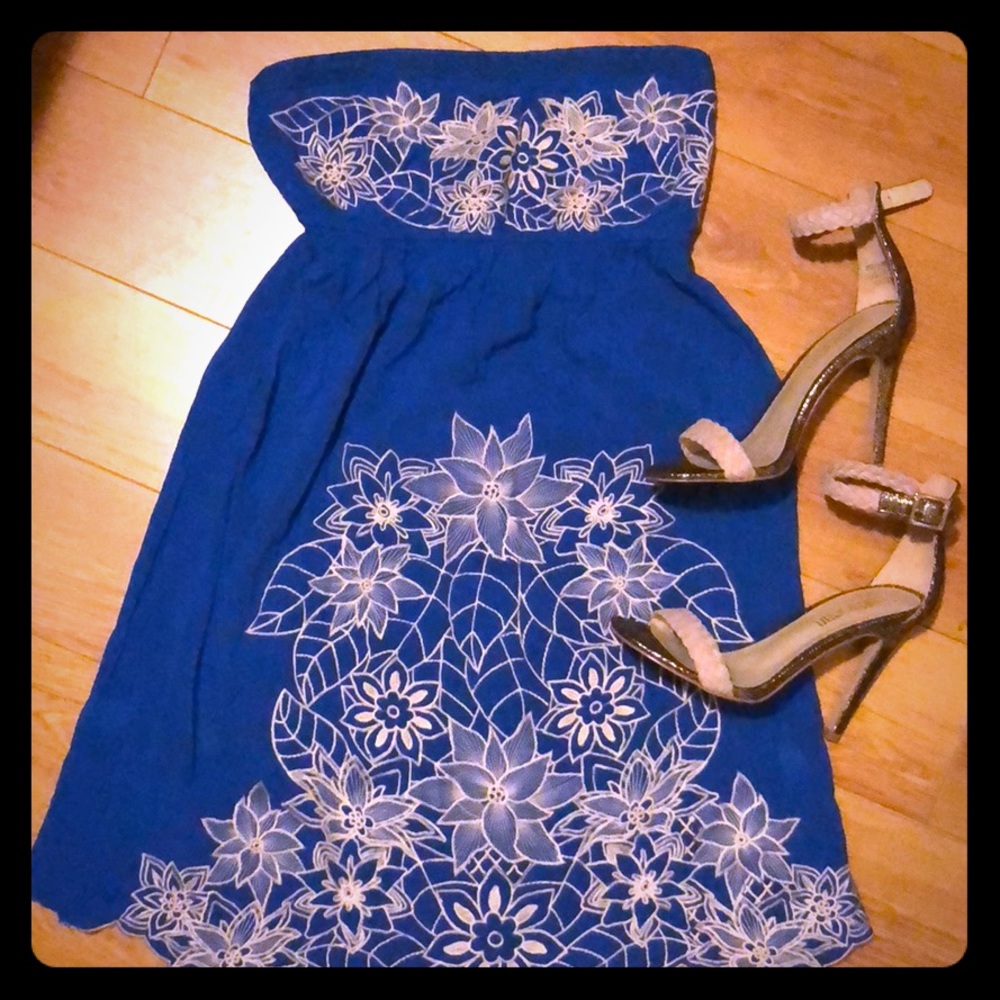 Blue summer dress with white embroidery